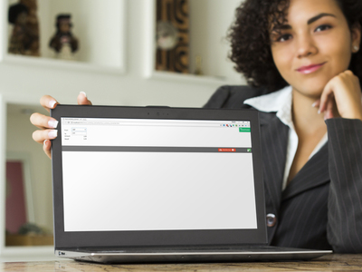 Photo of a woman with a screen showing the currency converter calculator used in the tour